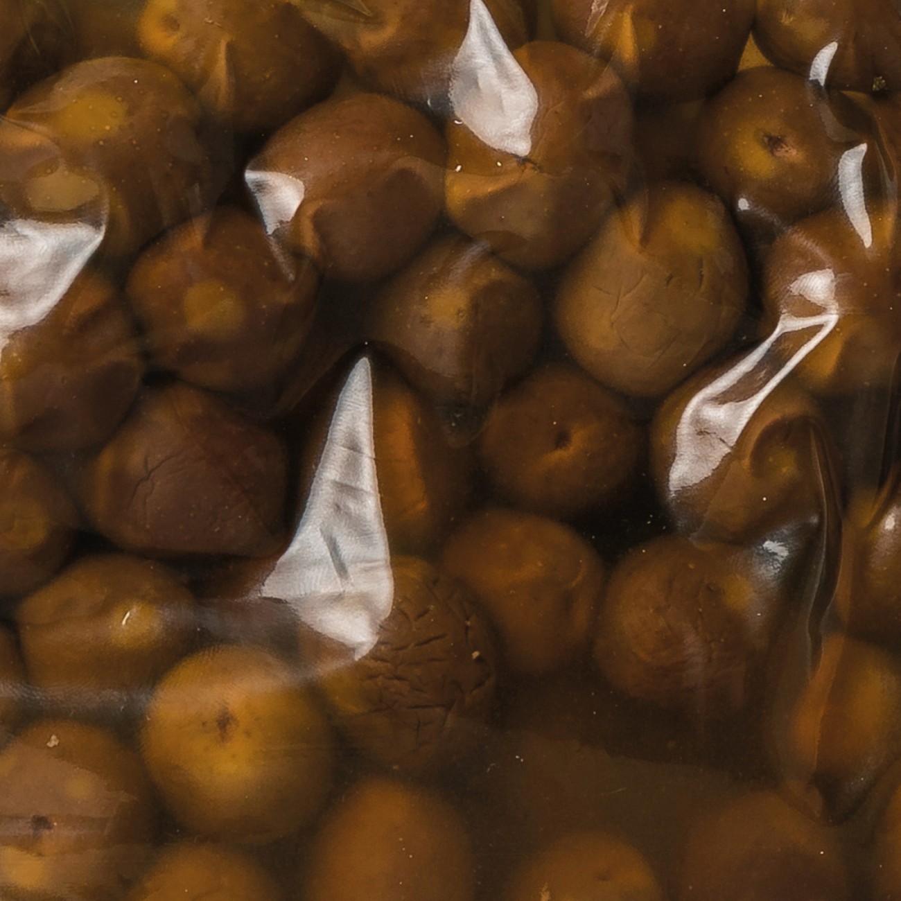 Olive nere in salamoia varietà Nocellara del Belìce metodo al naturale